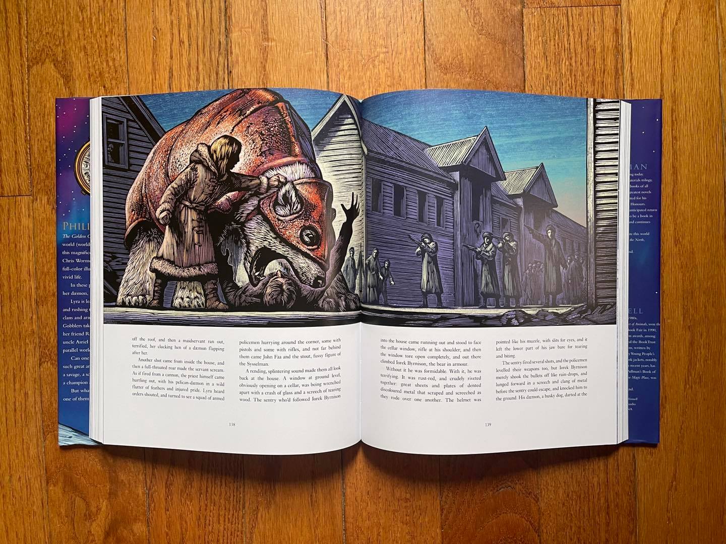 A spread of pages 138-139 of the illustrated edition of The Golden Compass, featuring a polar bear an Lyra.