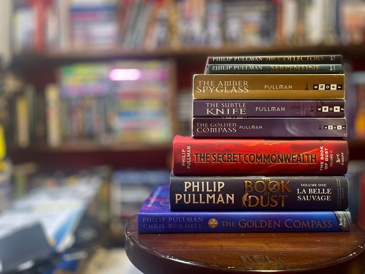A stack of books by Philip Pullman